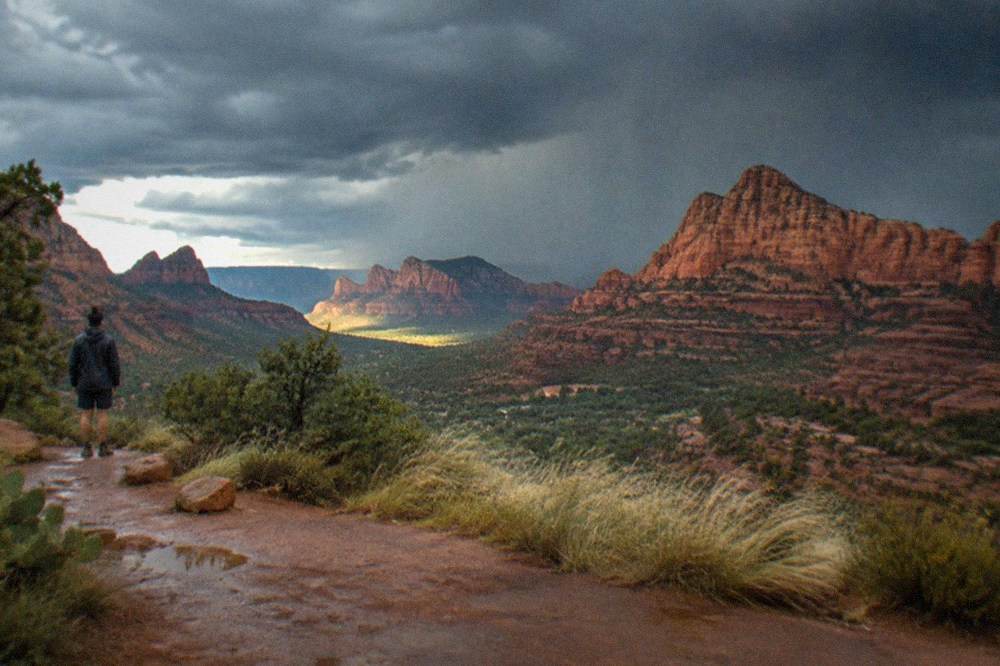 Dark monsoon storm clouds building over red rock formations near Sedona