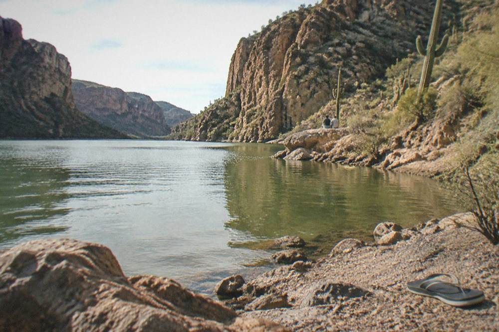 Canyon Lake water framed by desert rock formations near Tortilla Flat