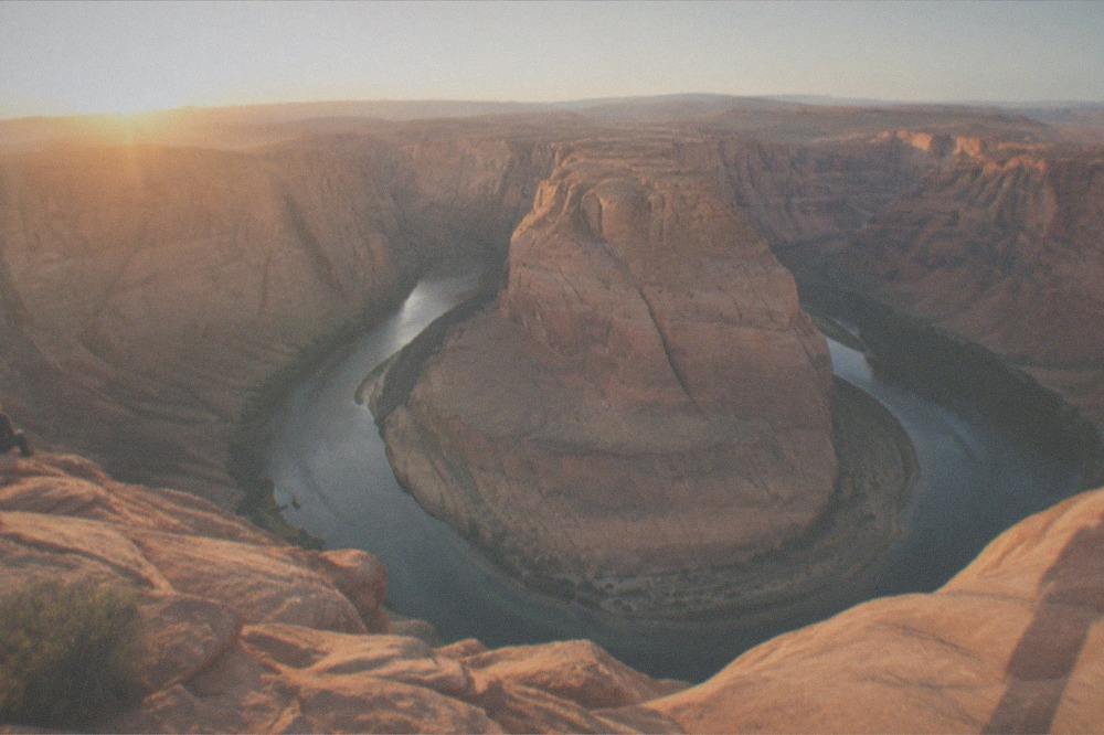 Horseshoe Bend overlook with the Colorado River curving around a sandstone cliff